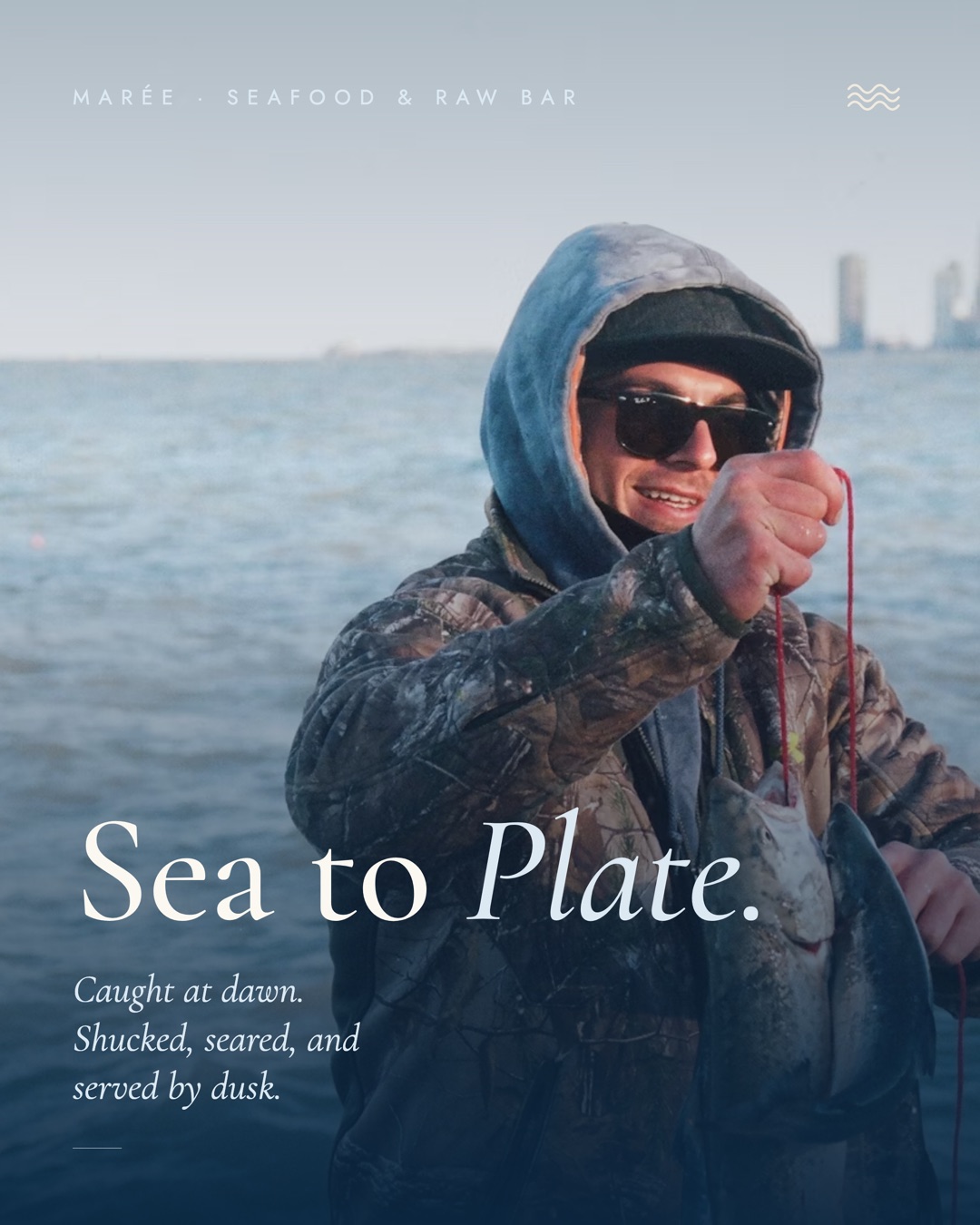 Marée grid post reading Sea to Plate, over a photo of a fisherman at dawn